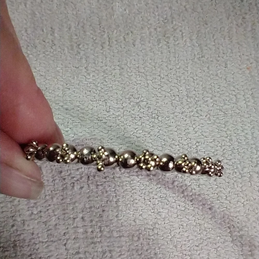 Silvertone decorative bangle bracelet